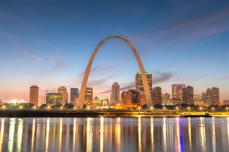St. Louis and the Gateway Arch on the Mississippi at dusk